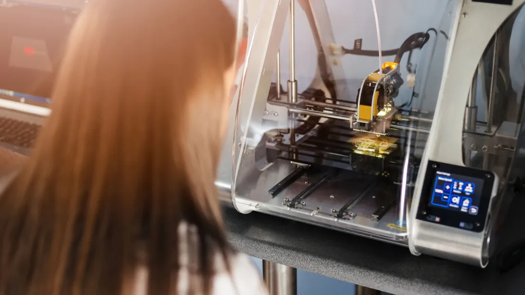 Woman at 3D Printer