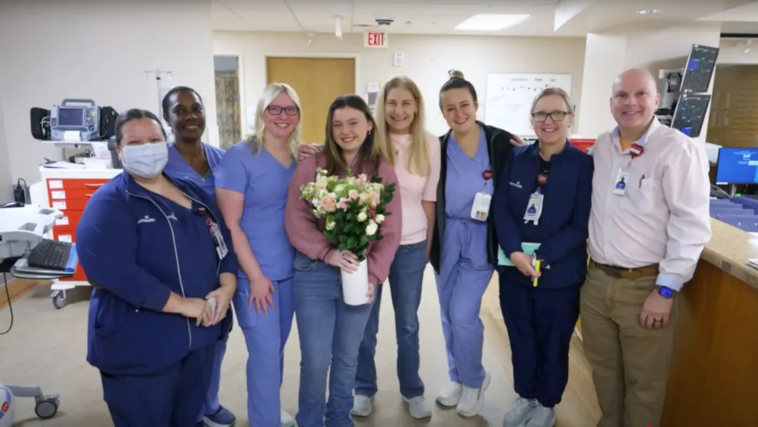 Patient surrounded by the AdventHealth staff