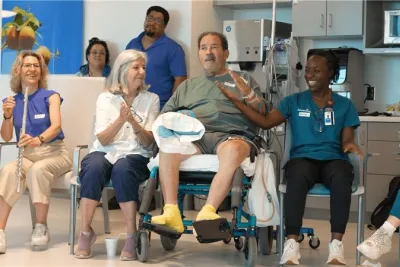 AdventHealth patient and family with staff members