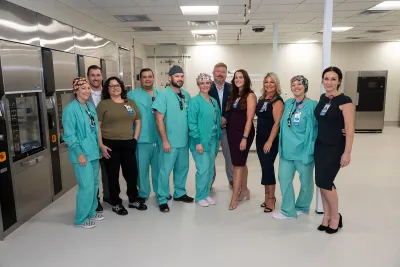 Group of physicians at the ribbon cutting of Wesley Chapel.