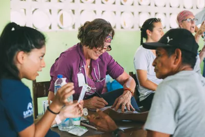 Provider helping patient