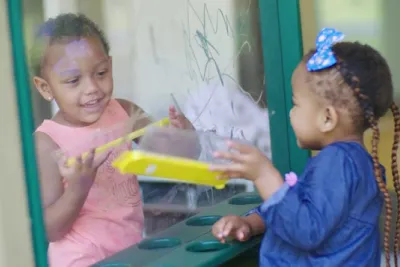 Two children playing together.