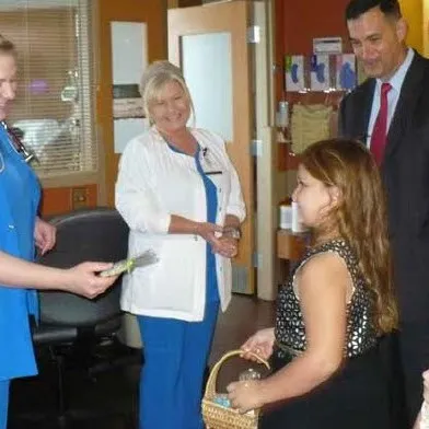 John and his nieces handing out cookies to the team that helped Timothy.