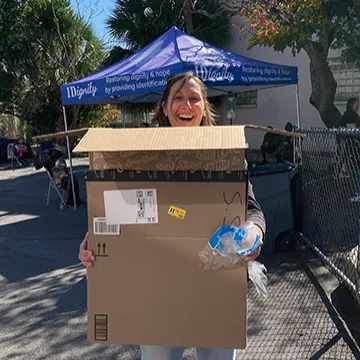 Staff member helping at iDignity