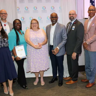 Abel Biri and Holly Soucy joined by other AdventHealth team members during the recent Hispanic Chamber of Commerce Healthcare Awards. 