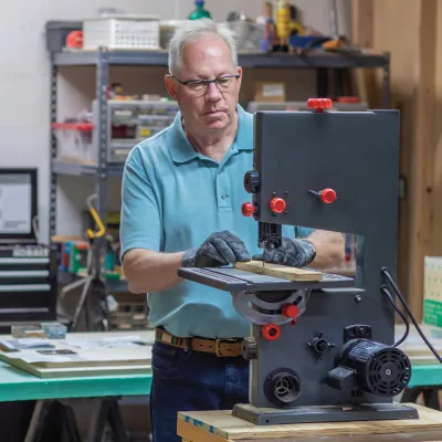 Older Man Working in Workshop