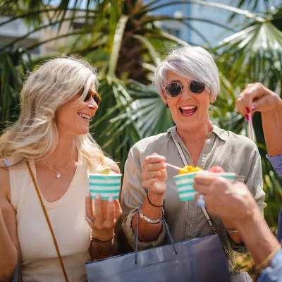 A group of women eating dessert.