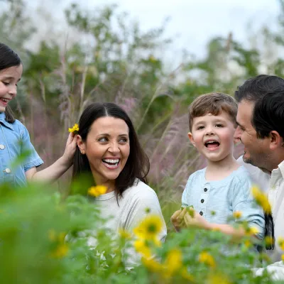 A happy family spending times outdoors.