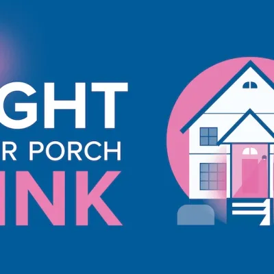 Image text reads "Light Your Porch Pink." Image features a white house with a pink glow. 