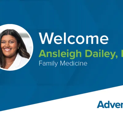 A banner with text that reads "Welcome Ansleigh Dailey, PA-C, Family Medicine — AdventHealth Medical Group." A circle frame holds a photo of Dailey, a brown-skinned woman with dark hair and wearing a white coat.