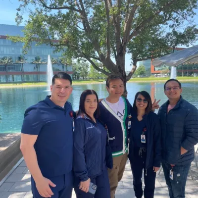 JohnPaul (JP) Bautista (middle) demonstrates the importance of creating relationships with his fellow colleagues throughout the TAP initiative and beyond. 