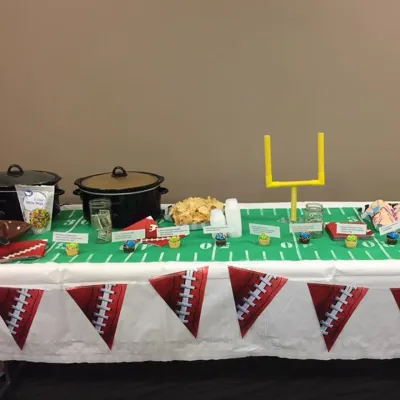 A table decorated with football theme.