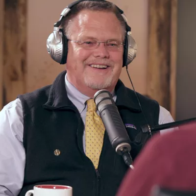 Bruce Potts talking into mic