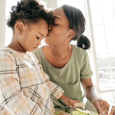 Mother comforting child in a time of need.