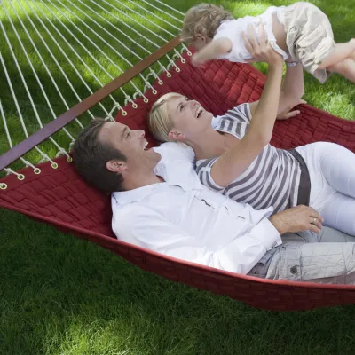 A family enjoys time outside together in the summer.