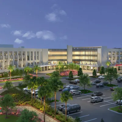 Exterior rendering of AdventHealth Riverview at night.