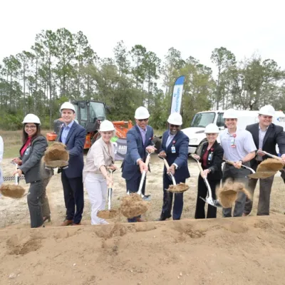 Waterman MOB shoveling dirt groundbreaking