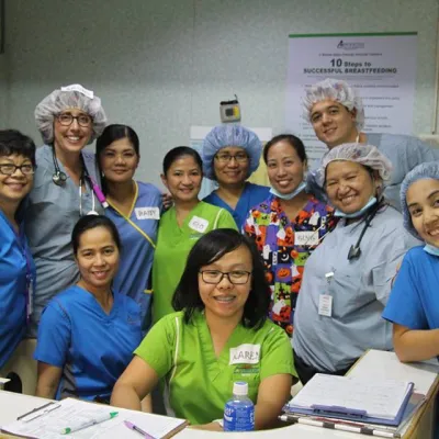 Team of doctors posing for a picture.