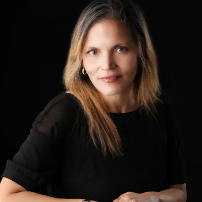 A headshot of Anna Colon-Negron