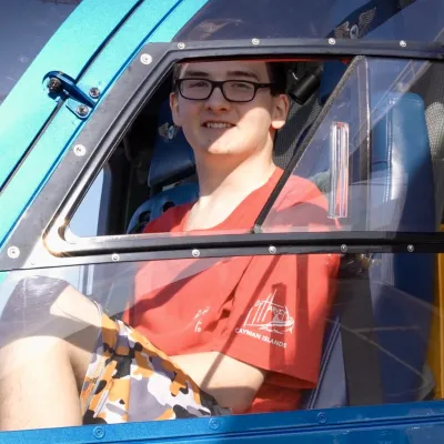 Teenager Anthony Moir sits in cockpit of AdventHealth's Flight 1 medical helicopter