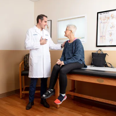 Doctor talking to patient