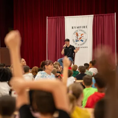 NASCAR driver shares stories and a surprise with Rymfire students