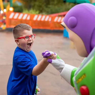 A boy with Buzz Lightyear at Disney's Hollywood Studios.