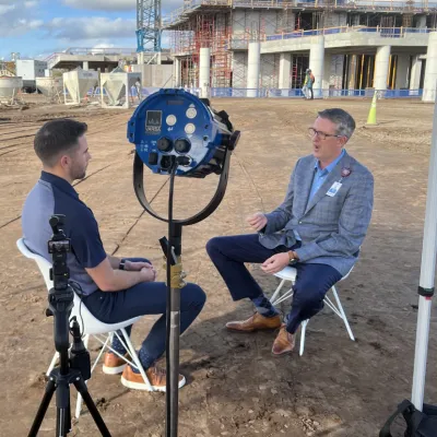 Brian Adams sits down for an interview with a reporter from News 6. 