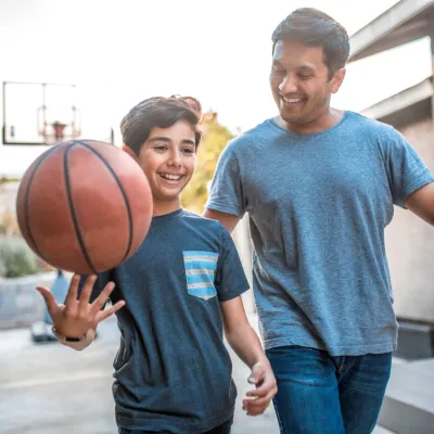 Father Son Outside Playing Basketball