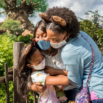 3 Generations of Women Hugging at the Tree of Life at Disney's Animal Kingdom