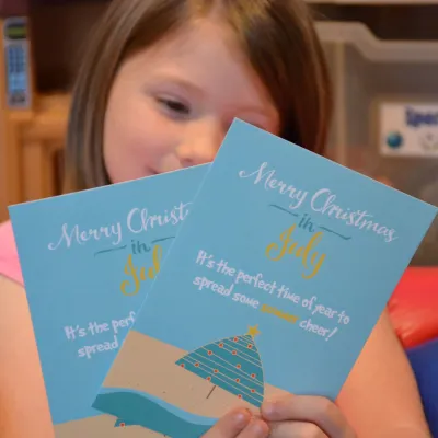 A girl with christmas cards