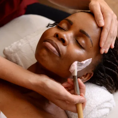 african american lady getting a facial