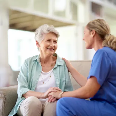 Older woman with a nurse.