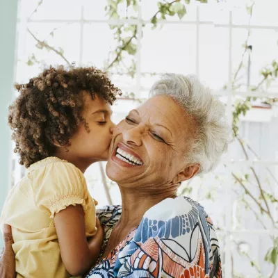 grandmother holding child