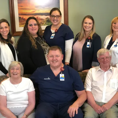 Irene and Peter Ferguson reunite with nurse Greg Prince and other members of the care team.
