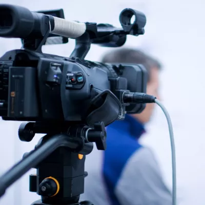 Behind-the-scenes on an interview shoot with reporter