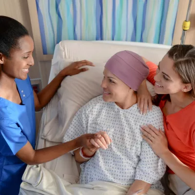 Cancer Patient speaking with doctor.