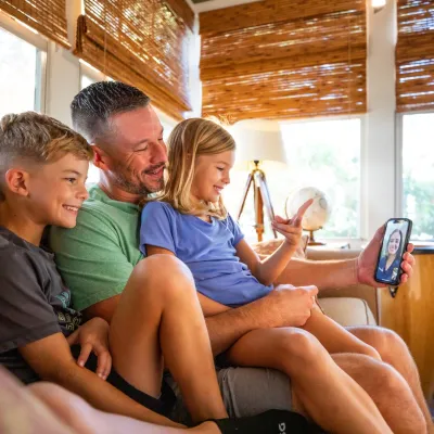 Patient and children sit during virtual visit