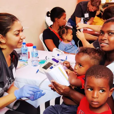 Volunteer with patients in the Dominican Republic