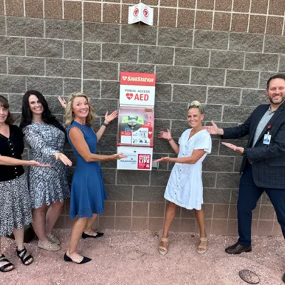 Kara stands outside the new AED at Redstone Elementary