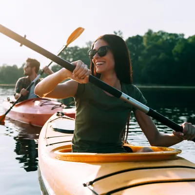 Couple Kayaking on a lake.