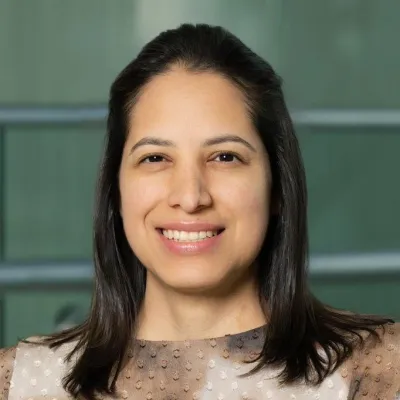 Woman wearing brown blouse