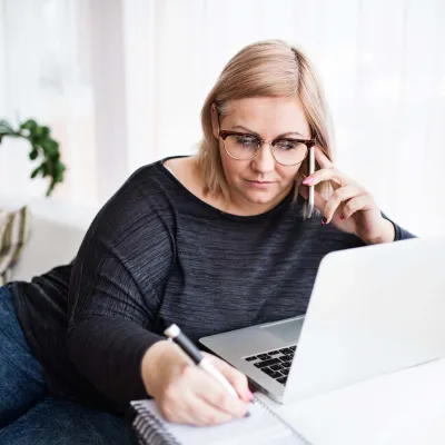 LP-50-50-insert-Bariatrics-MULTI-CentraTX-Woman-talking-on-phone-and-taking-notes