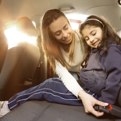 mother and daughter in car