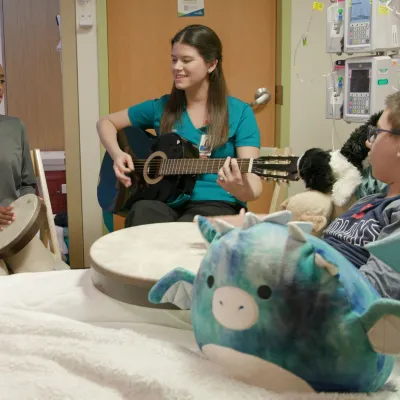 Patients receive music therapy.