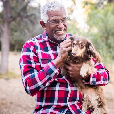 A man walking his dog.
