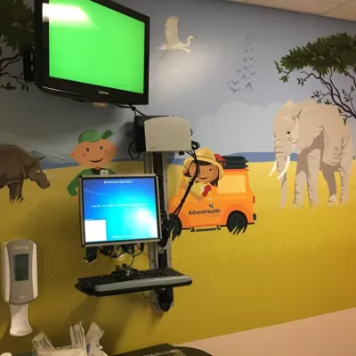 Child friendly murals on an ER room wall