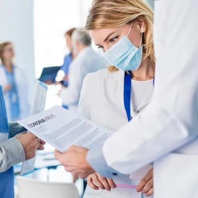 female physician in face mask