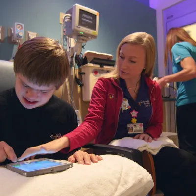 Patient Sean Sikora about to have his blood drawn.