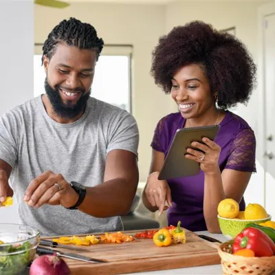 Couple cooking healthy food